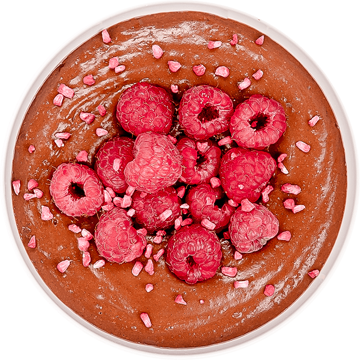 Chocolate millet pudding with almond milk and raspberries