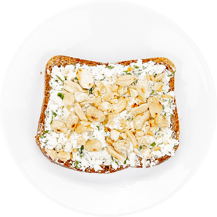 Sandwich with feta cheese and rocket paste