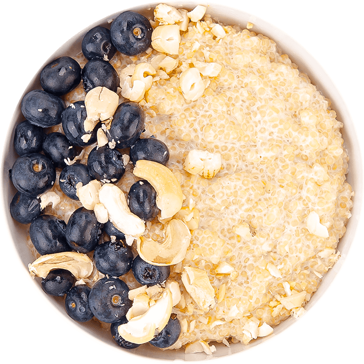 Quinoa porridge with almond milk, blueberries and cashew nuts