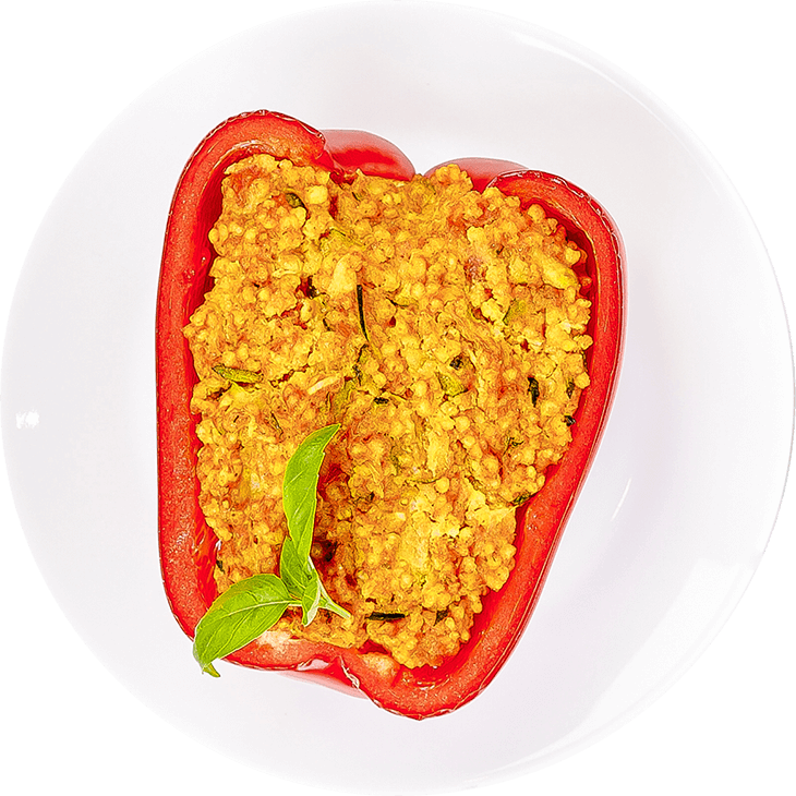 Stuffed pepper with millet, tomatoes and courgette