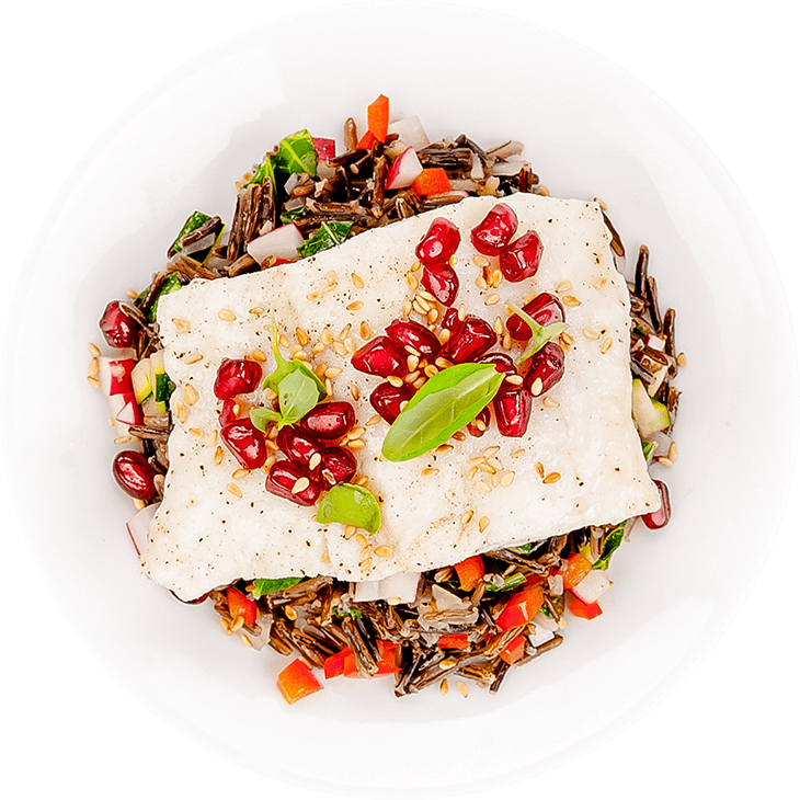 Baked cod on black rice with vegetables