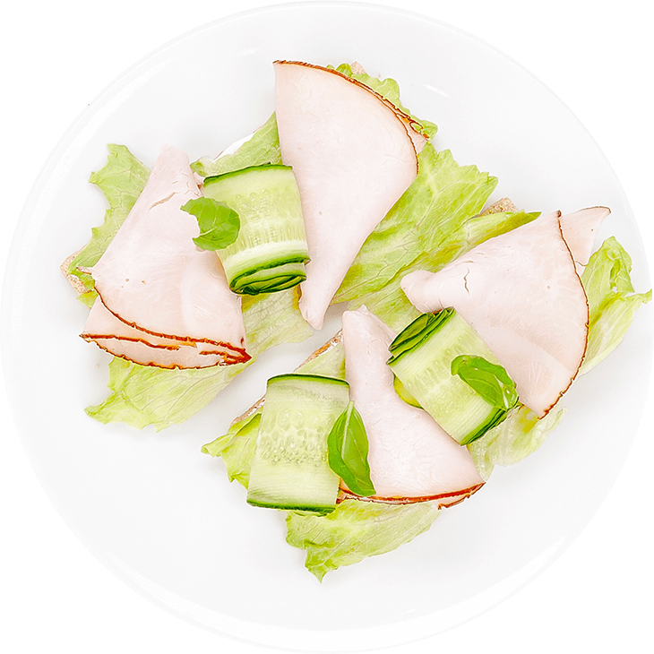 Crispbread with ham, cucumber and spread cheese