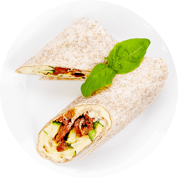Tortilla wrap with hummus, courgette and rocket
