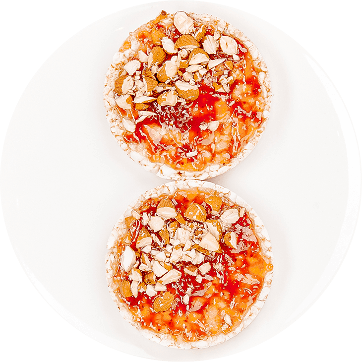 Rice cakes with jam and almonds