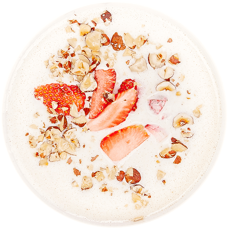 Vanilla millet pudding with almond milk, strawberries and walnuts