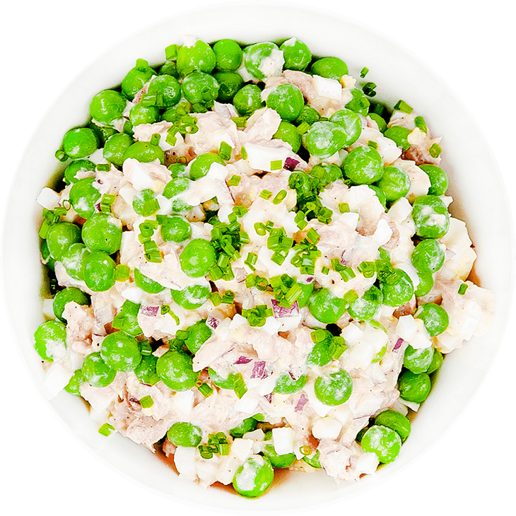 Salad with tuna, egg, garden peas and onion